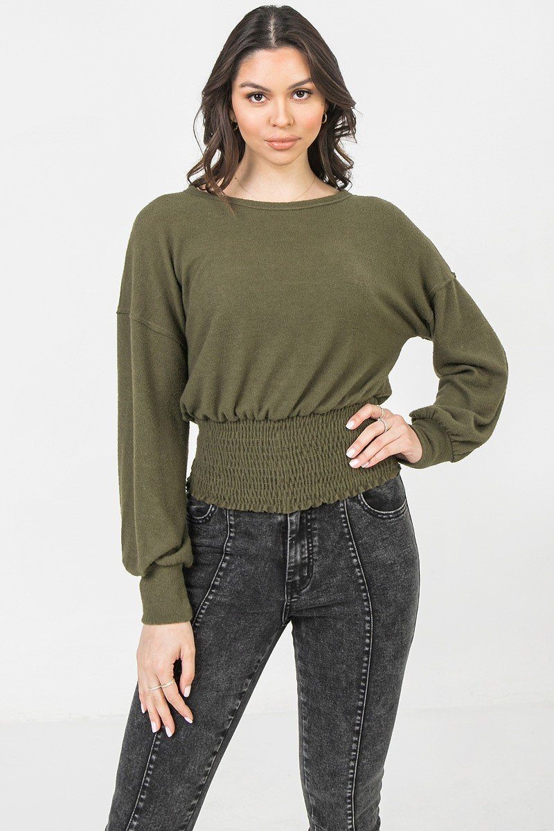 A Knit Top Featuring Wide Neckline