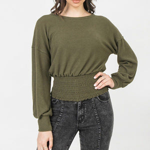 A Knit Top Featuring Wide Neckline