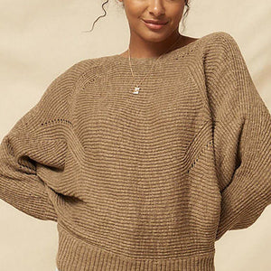 A Ribbed Knit Sweater