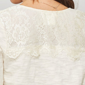 A Knit Top With Deep V Neckline And Yoke Design