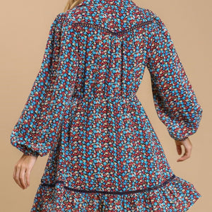 Collared neckline button down floral print dress with crochet trimmed details