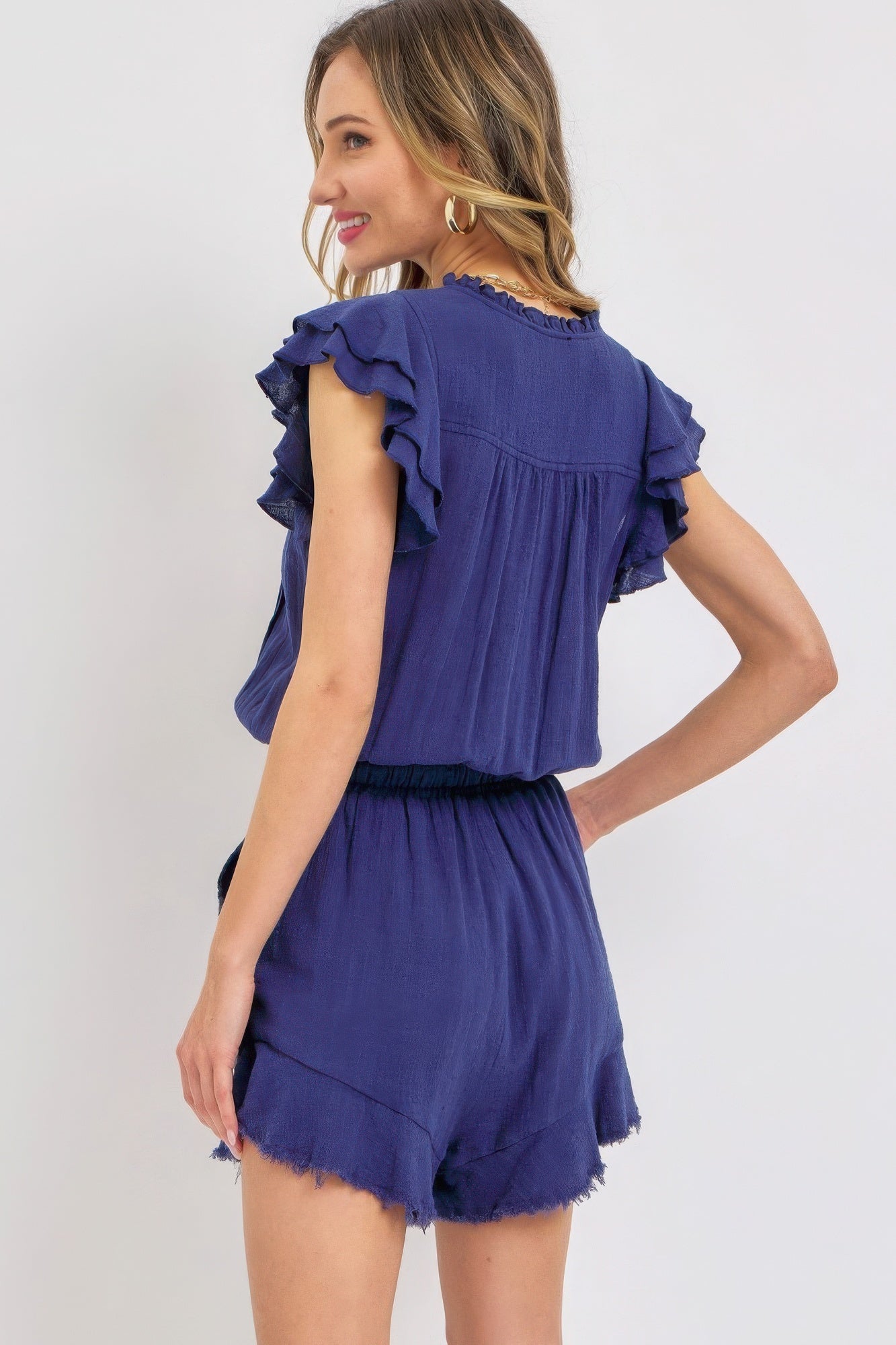 Ruffle Romper in Ink Blue